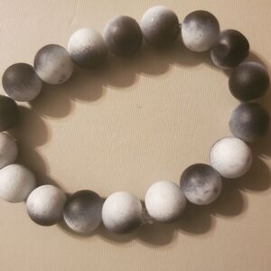 Handmade by my daughter. Beautiful Matte black and white beaded bracelet.